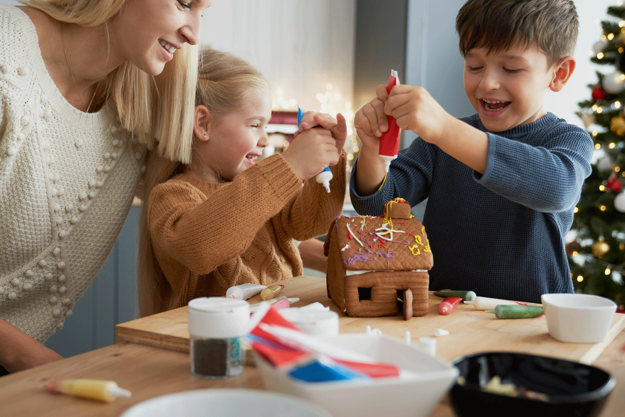 much-fun-while-decorating-gingerbread-house_cla-1